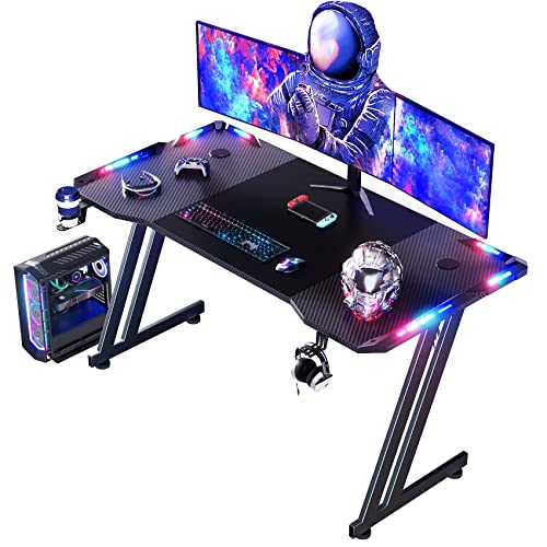 HLDIRECT LED Gaming Desk 55 Inch Ergonomic Gamer Workstation Gamer Carbon Fibre Surface Large Compuster Desk with Cup Holder & Hedphone Hook Black